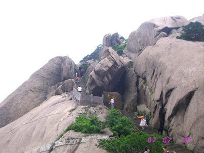 tourist climbing in huangshan mountain